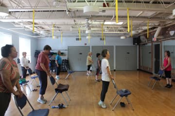 Chair exercises were part of National Senior Health & Fitness Day at the Rye YMCA. 