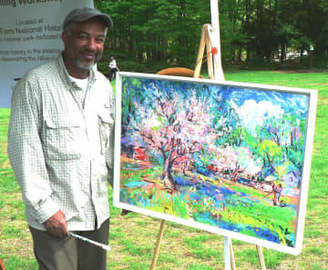 Artist and author Dmitri Wright will sign his new book, "My Dancing Brush," Thursday at the Silvermine Arts Center in New Canaan, Conn.