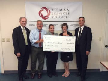 First County Bank's David Van Buskirk, AVP and business development officer, and Wendy Macedo, AVP and branch manager presented a check for $10,000 to the Human Services Council in support of the Norwalk Mentor Program.