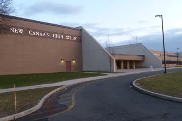 A New Canaan High School student was charged with posting a threatening post on Snapchat.