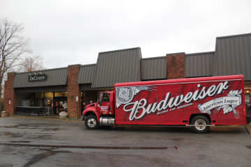 A beer truck arrives with an early morning shipment at DeCicco's in Cross River.