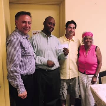 Eastchester Town Councilman LuigiMarcoccia, ECAP Director Don Brown, Danny Lange and Advisory Council Chair Lovely Billups.