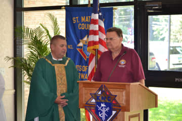 Monsignor Walter Orlowski, pastor of St. Matthew Parish and chaplain for the Knights of Columbus Council No. 14360 and Ron Miller, chairman of the Knights of Columbus Communion Breakfast.