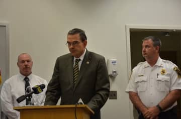 Westchester County Police Commissioner George Longworth (center) at a press briefing Monday in Mount Kisco.