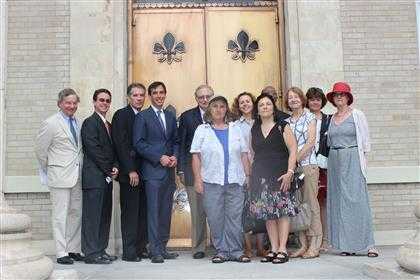 New York State Assemblyman Steve Otis, Iona College Professor Michael J. Hughes, City Manager Charles B. Strome, III, and Mayor Noam Bramson with members of the New Rochelle Sister City Committee.