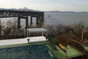 Tarrytown wants to sell a piece of underwater land just north of the existing Tappan Zee Bridge, as seen from the Quay Condominiums in this file photo.