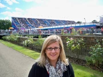 College of New Rochelle Professor Amy Bass, shown here at the London Olympics, won an Emmy award for her work with NBC.