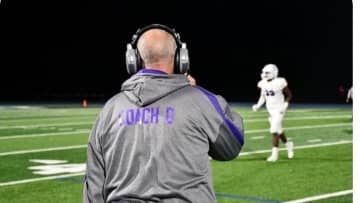 New Rochelle football coach Lou DiRienzo was unexpectedly suspended by the school district.