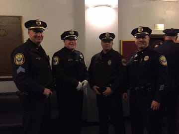 Ryan Tharas, second from left, joined the Bethel Police Department after training at the Connecticut Police Academy for the past six months.