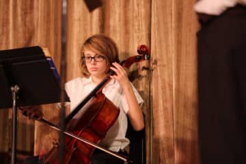 A Tuckahoe Middle School student performs at the winter concert.