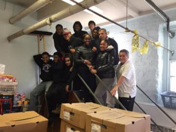 Campus Alternative high school students and faculty kicked off the holiday season by bringing food to needy families in New Rochelle.