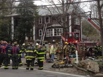 One person died Saturday in a fire in a Norwalk home where firefighters encountered hoarding conditions.