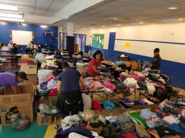 Volunteers in New Rochelle organizing the donations that will be shipped to Mexico City and Puerto Rico.