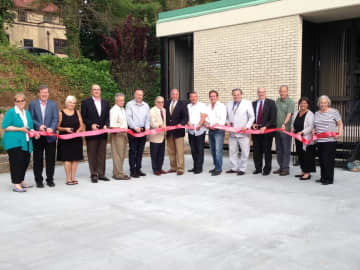 Eastchester town and library officials unveiling the brand new reading courtyard.