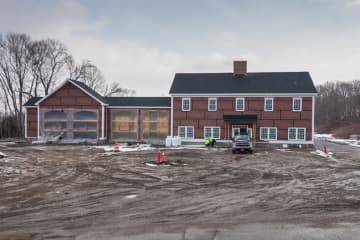 Construction continues on the new firehouse in Newtown. To date the windows, roof and doors have been installed so construction can move to the inside.