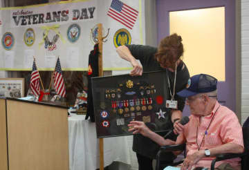 Waveny Village resident and decorated veteran Anthony Moody shared his personal account of the Battle of the Bulge in World War II for a Veterans Day event this week.