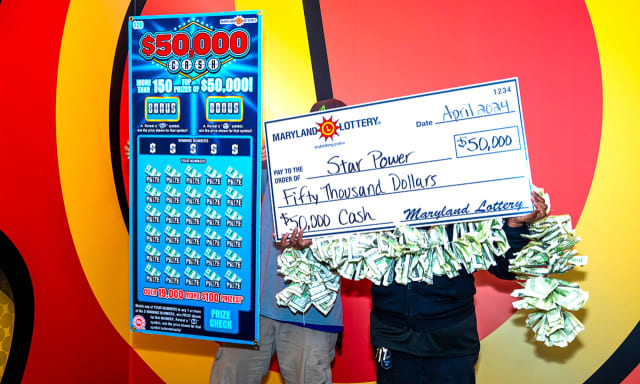 Bowie winner Bren Bren, who owns a junk removal company “Star Power”, celebrated her top-prize win from a $50,000 Cash scratch-off with her friend at Lottery headquarters.
  
