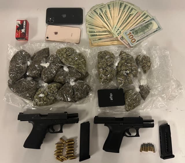 The drugs and guns recovered by the Anne Arundel County Police Department.