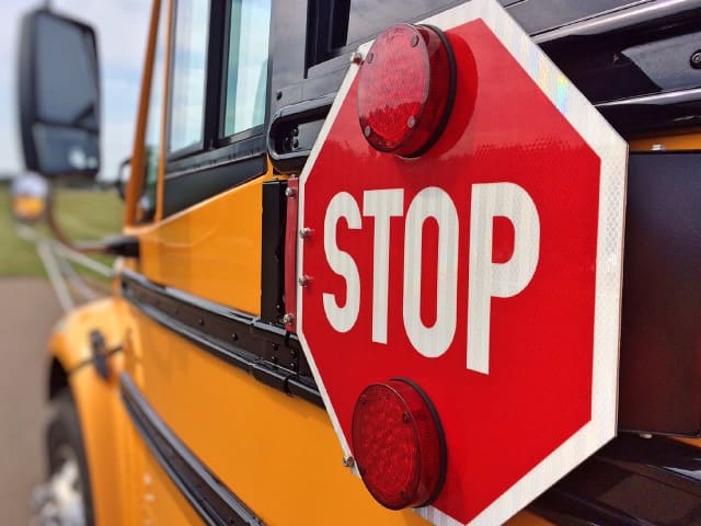 School bus stop sign.